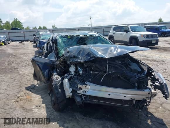 2022 Toyota Camry Hybrid LE with VIN 4T1C31AK2NU575304, listed as a IAAI auction lot 43017963 with 165,647 mi miles and . Bid and sale history available at DreamBid. Image 1.