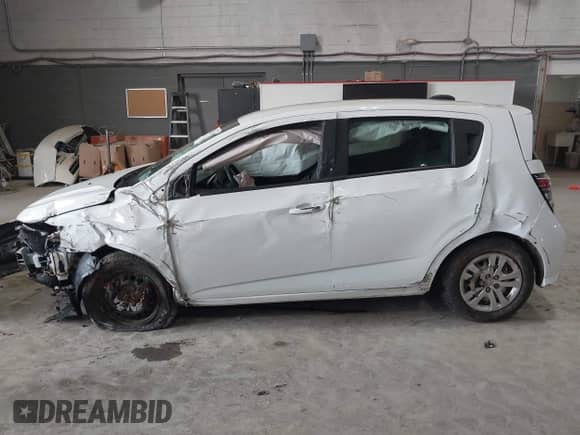 2020 Chevrolet Sonic LT with VIN 1G1JG6SB9L4110004, listed as a IAAI auction lot 41921452 with 106,676 mi miles and . Bid and sale history available at DreamBid. Image 15.