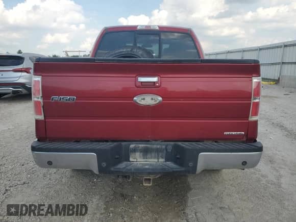 2013 Ford F-150 Lariat with VIN 1FTFW1ET7DKF18182, listed as a Copart auction lot 68183995 with 165,863 mi miles and Salvage title. Bid and sale history available at DreamBid. Image 6.