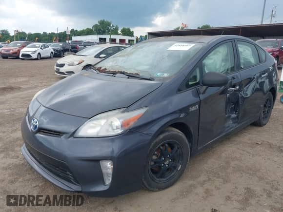 2013 Toyota Prius with VIN JTDKN3DP5D3037147, listed as a IAAI auction lot 42818167 with 261,432 mi miles and . Bid and sale history available at DreamBid. Image 2.