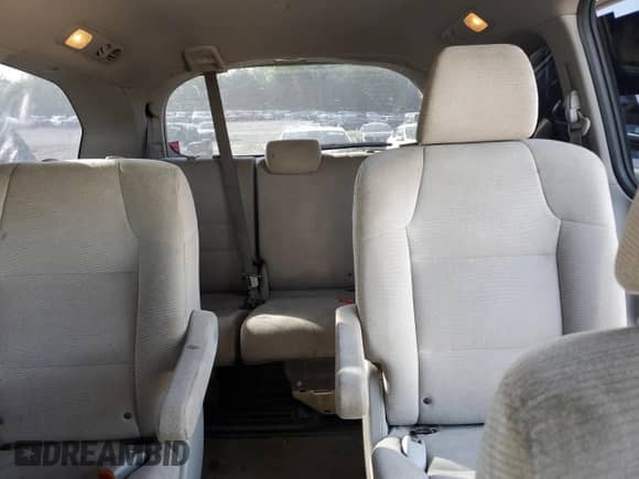 2012 Honda Odyssey LX z VIN 5FNRL5H23CB114839, wystawiony jako Copart lot #57137305 z przebiegiem 205 439 mil mil oraz Szkoda całkowita • Salvage title. Historia ofert i sprzedaży dostępna na DreamBid. Obrazek 10.