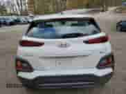 2021 Hyundai Kona SE z VIN KM8K1CAA4MU718515, wystawiony jako Copart lot #86276245 z przebiegiem 91 252 mil mil oraz Szkoda całkowita • Salvage title. Historia ofert i sprzedaży dostępna na DreamBid. Obrazek 6.