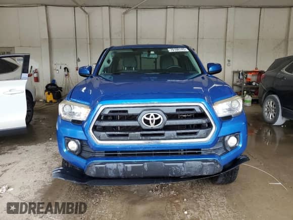 2016 Toyota Tacoma SR5 с VIN 5TFSZ5AN2GX033475, выставлен на аукционе Copart как лот 70106145 с пробегом 147 360 миль миль и Списание • Salvage title. История ставок и продаж доступна на DreamBid. Изображение 5.