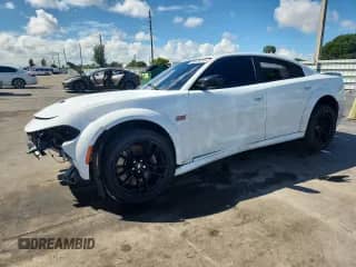 2023 Dodge Charger Scat Pack with VIN 2C3CDXGJ2PH646143, listed as a Copart auction lot 85075215 with 31,823 mi miles and Non repairable. Bid and sale history available at DreamBid. Image 1.