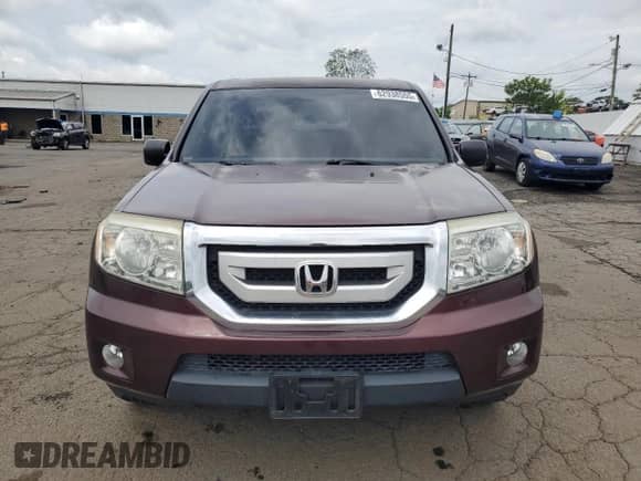 2010 Honda Pilot LX with VIN 5FNYF3H20AB001676, listed as a Copart auction lot 62938555 with 140,370 mi miles and Salvage title. Bid and sale history available at DreamBid. Image 5.