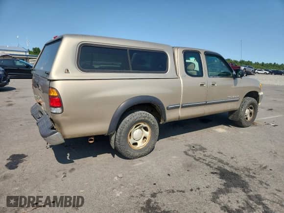 2002 Toyota Tundra SR5 z VIN 5TBRN34102S254202, wystawiony jako Copart lot #71814075 z przebiegiem 167 582 mil mil oraz Szkoda całkowita • Salvage title. Historia ofert i sprzedaży dostępna na DreamBid. Obrazek 3.