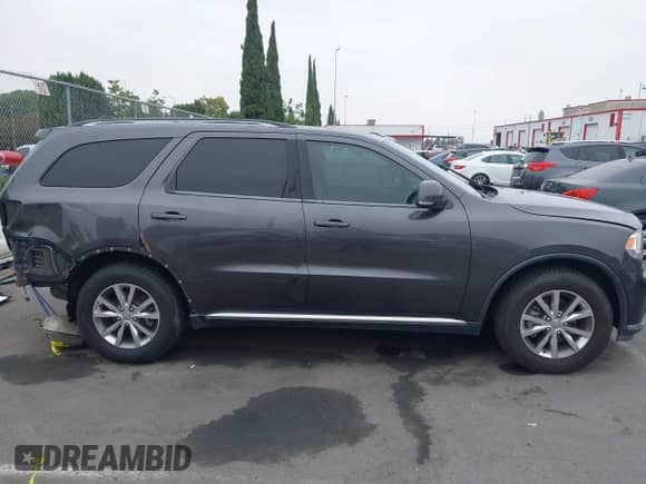 2015 Dodge Durango Limited with VIN 1C4RDHDG5FC200994, listed as a IAAI auction lot 42990429 with 145,843 mi miles and . Bid and sale history available at DreamBid. Image 14.