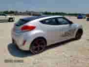 2013 Hyundai Veloster w/Black Int z VIN KMHTC6AD9DU147646, wystawiony jako Copart lot #58495585 z przebiegiem 121 781 mil mil oraz Szkoda całkowita • Salvage title. Historia ofert i sprzedaży dostępna na DreamBid. Obrazek 3.
