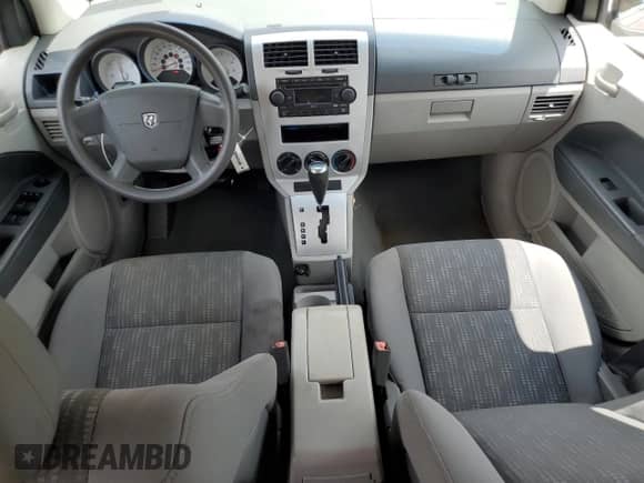 2007 Dodge Caliber with VIN 1B3HB28BX7D569537, listed as a Copart auction lot 66405265 with 118,037 mi miles and Salvage title. Bid and sale history available at DreamBid. Image 8.