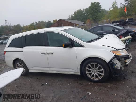 2012 Honda Odyssey Touring с VIN 5FNRL5H95CB095725, выставлен на аукционе IAAI как лот 43296749 с пробегом 237 102 миль миль и . История ставок и продаж доступна на DreamBid. Изображение 14.