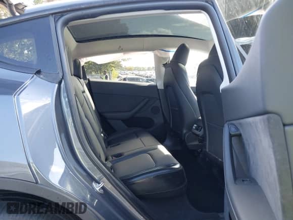 2023 Tesla Model Y Long Range with VIN 7SAYGDEE4PA192738, listed as a IAAI auction lot 43364402 with 14,872 mi miles and . Bid and sale history available at DreamBid. Image 8.