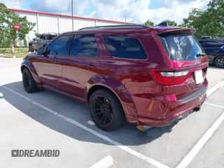 2021 Dodge Durango SRT Hellcat with VIN 1C4SDJH91MC716142, listed as a IAAI auction lot 43523331 with 37,058 mi miles and . Bid and sale history available at DreamBid. Image 3.