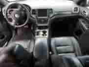 2014 Jeep Grand Cherokee Limited с VIN 1C4RJEBG9EC255635, выставлен на аукционе Copart как лот 87192874 с пробегом 175 681 миль миль и Списание • Salvage title. История ставок и продаж доступна на DreamBid. Изображение 8.