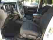 2022 Jeep Wrangler Unlimited Sport S with VIN 1C4HJXDGXNW180902, listed as a Copart auction lot 62868865 with 25,210 mi miles and Salvage title. Bid and sale history available at DreamBid. Image 7.