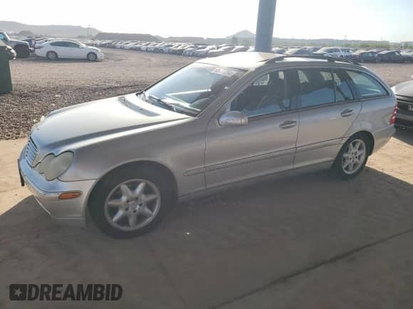 2004 Mercedes-Benz C 240 with VIN WDBRH61J64F464874, listed as a Copart auction lot 65477264 with 184,239 mi miles and Salvage title. Bid and sale history available at DreamBid. Image 1.
