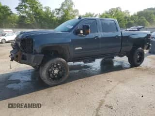 2018 Chevrolet Silverado 2500HD High Country с VIN 1GC1KXEY2JF172180, выставлен на аукционе Copart как лот 59493365 с пробегом 94 129 миль миль и Списание • Salvage title. История ставок и продаж доступна на DreamBid. Изображение 1.