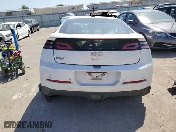 2015 Chevrolet Volt z VIN 1G1RB6E44FU112181, wystawiony jako Copart lot #65770043 z przebiegiem Nie podano mil oraz . Historia ofert i sprzedaży dostępna na DreamBid. Obrazek 6.