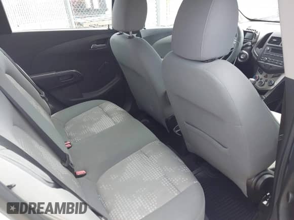 2012 Chevrolet Sonic LS z VIN 1G1JA6SHXC4129814, wystawiony jako IAAI lot #42654984 z przebiegiem 160 545 mil mil oraz . Historia ofert i sprzedaży dostępna na DreamBid. Obrazek 8.
