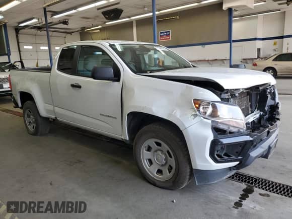 2021 Chevrolet Colorado 2WD Work Truck with VIN 1GCHSBEN0M1263926, listed as a Copart auction lot 61946105 with 77,231 mi miles and Salvage title. Bid and sale history available at DreamBid. Image 4.