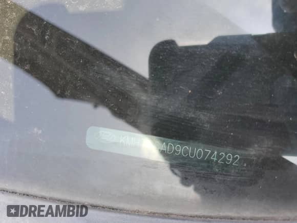 2012 Hyundai Veloster w/Red Int z VIN KMHTC6AD9CU074292, wystawiony jako Copart lot #56371095 z przebiegiem Nie podano mil oraz Czysty tytuł • Clean title. Historia ofert i sprzedaży dostępna na DreamBid. Obrazek 12.