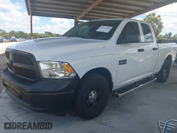 2013 Ram 1500 Tradesman z VIN 1C6RR6FP0DS509897, wystawiony jako IAAI lot #42531385 z przebiegiem 298 076 mil mil oraz . Historia ofert i sprzedaży dostępna na DreamBid. Obrazek 2.