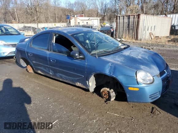 2003 Dodge Neon SXT with VIN 1B3ES56C93D140657, listed as a Copart auction lot 86829224 with 196,870 mi miles and Salvage title. Bid and sale history available at DreamBid. Image 4.