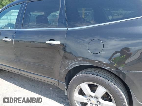 2016 Chevrolet Traverse LT with VIN 1GNKRGKD3GJ268804, listed as a IAAI auction lot 42568889 with 97,499 mi miles and . Bid and sale history available at DreamBid. Image 21.