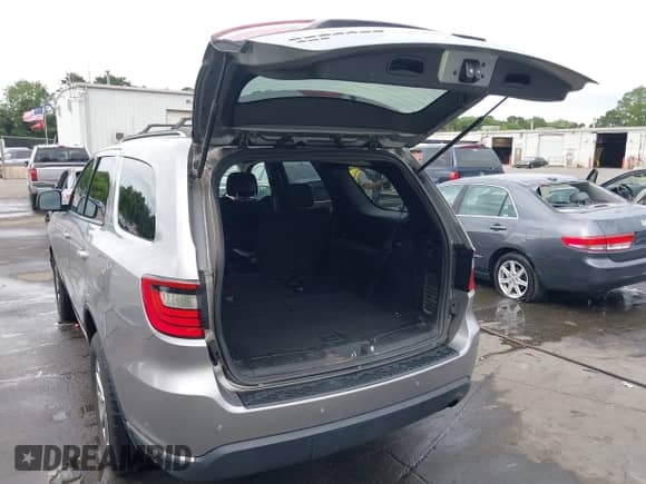 2017 Dodge Durango SXT with VIN 1C4RDJAGXHC881135, listed as a IAAI auction lot 42752455 with 62,702 mi miles and . Bid and sale history available at DreamBid. Image 3.