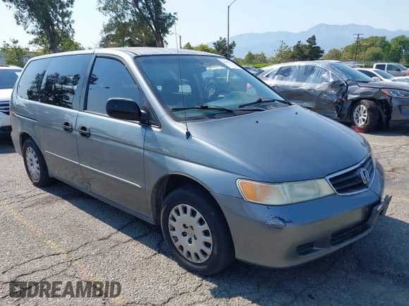 2002 Honda Odyssey LX with VIN 2HKRL18582H553425, listed as a IAAI auction lot 42691711 with 272,751 mi miles and . Bid and sale history available at DreamBid. Image 1.