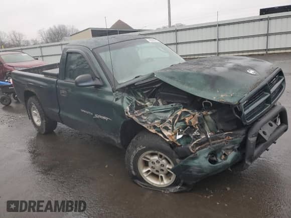 2000 Dodge Dakota с VIN 1B7FL26X4YS723738, выставлен на аукционе Copart как лот 43322515 с пробегом 225 641 миль миль и Списание • Salvage title. История ставок и продаж доступна на DreamBid. Изображение 4.
