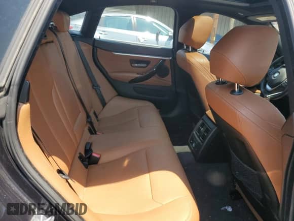 2016 BMW 4 Series 428i xDrive z VIN WBA4C9C50GG140732, wystawiony jako Copart lot #66198135 z przebiegiem 80 977 mil mil oraz Szkoda całkowita • Salvage title. Historia ofert i sprzedaży dostępna na DreamBid. Obrazek 10.