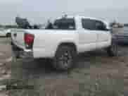 2018 Toyota Tacoma TRD Off Road with VIN 3TMCZ5ANXJM138363, listed as a Copart auction lot 84400805 with 95,418 mi miles and Salvage title. Bid and sale history available at DreamBid. Image 3.