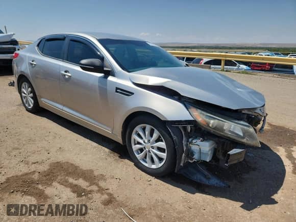 2014 Kia Optima LX z VIN 5XXGM4A73EG320179, wystawiony jako Copart lot #69755295 z przebiegiem 128 802 mil mil oraz Szkoda całkowita • Salvage title. Historia ofert i sprzedaży dostępna na DreamBid. Obrazek 4.