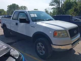 2005 Ford F-150 STX with VIN 1FTRX14W95NA67133, listed as a IAAI auction lot 43126670 with 246,945 mi miles and . Bid and sale history available at DreamBid. Image 1.