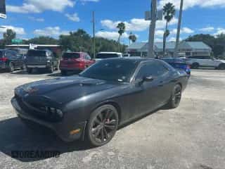 2010 Dodge Challenger SRT-8 с VIN 2B3CJ7DW8AH111105, выставлен на аукционе Copart как лот 89510155 с пробегом 128 671 миль миль и Чистый • Clean title. История ставок и продаж доступна на DreamBid. Изображение 2.