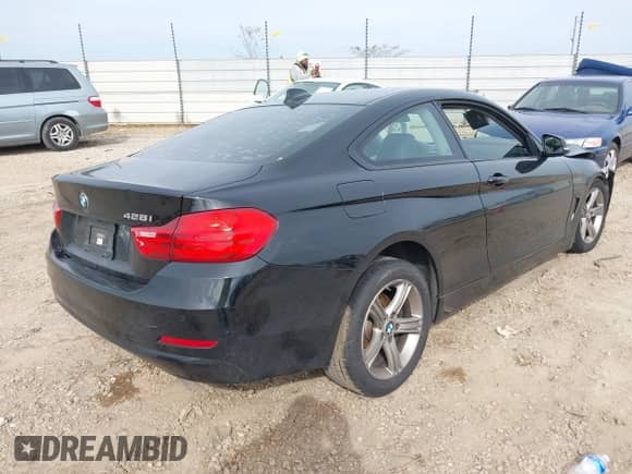 2015 BMW 4 Series 428i with VIN WBA3N3C57FK233259, listed as a IAAI auction lot 41324955 with 82,206 mi miles and . Bid and sale history available at DreamBid. Image 4.