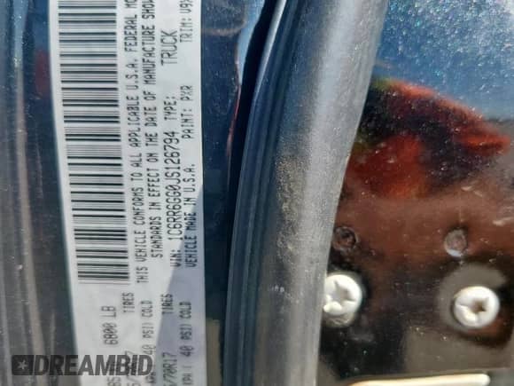 2018 Ram 1500 SLT z VIN 1C6RR6GG0JS126794, wystawiony jako Copart lot #86443685 z przebiegiem 210 215 mil mil oraz Czysty tytuł • Clean title. Historia ofert i sprzedaży dostępna na DreamBid. Obrazek 12.