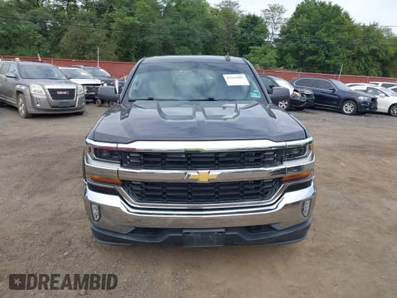 2016 Chevrolet Silverado 1500 LT z VIN 1GCVKREC5GZ267678, wystawiony jako IAAI lot #43234485 z przebiegiem Nie podano mil oraz . Historia ofert i sprzedaży dostępna na DreamBid. Obrazek 11.