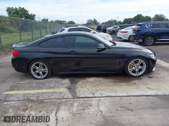 2017 BMW 4 Series 430i with VIN WBA4R7C50HK895865, listed as a IAAI auction lot 42667610 with 138,103 mi miles and . Bid and sale history available at DreamBid. Image 13.