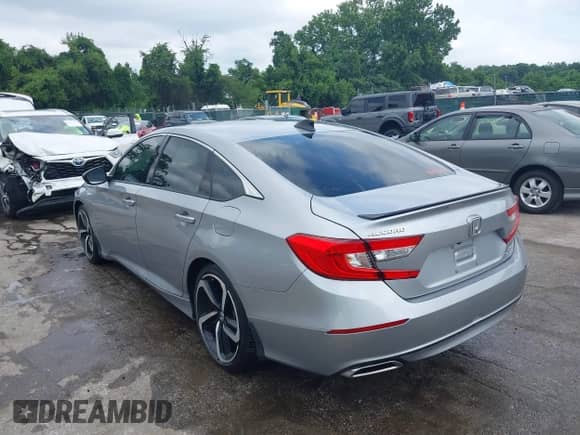 2021 Honda Accord Sport with VIN 1HGCV2F35MA004560, listed as a IAAI auction lot 42746583 with 63,997 mi miles and . Bid and sale history available at DreamBid. Image 3.