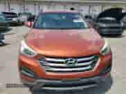 2015 Hyundai Santa Fe z VIN 5XYZT3LB0FG301688, wystawiony jako Copart lot #68935065 z przebiegiem 111 975 mil mil oraz Szkoda całkowita • Salvage title. Historia ofert i sprzedaży dostępna na DreamBid. Obrazek 5.