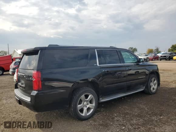 2015 Chevrolet Suburban LTZ с VIN 1GNSKKKC3FR229371, выставлен на аукционе Copart как лот 86870675 с пробегом 270 957 миль миль и Чистый • Clean title. История ставок и продаж доступна на DreamBid. Изображение 3.