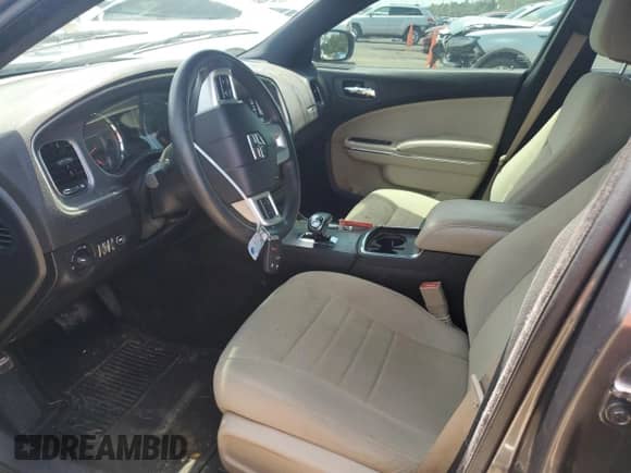 2014 Dodge Charger SE with VIN 2C3CDXBG1EH331701, listed as a Copart auction lot 61850095 with 134,108 mi miles and Salvage title. Bid and sale history available at DreamBid. Image 7.