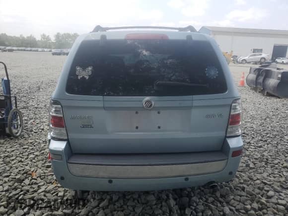 2008 Mercury Mariner Premier with VIN 4M2CU97138KJ12158, listed as a Copart auction lot 67723145 with 132,629 mi miles and Salvage title. Bid and sale history available at DreamBid. Image 6.