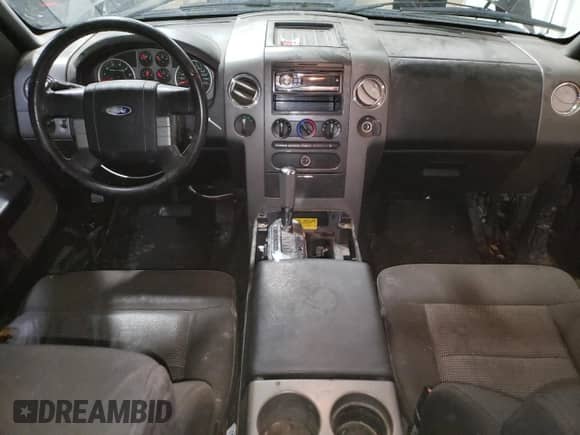 2005 Ford F-150 XLT с VIN 1FTPX14515FA57611, выставлен на аукционе Copart как лот 87058405 с пробегом Не указан миль и Списание • Salvage title. История ставок и продаж доступна на DreamBid. Изображение 8.