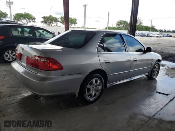 2001 Honda Accord LX с VIN 1HGCG56451A138839, выставлен на аукционе Copart как лот 81648265 с пробегом 215 937 миль миль и Списание • Salvage title. История ставок и продаж доступна на DreamBid. Изображение 3.