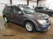 2015 Dodge Journey SXT with VIN 3C4PDCBG3FT742435, listed as a Copart auction lot 60710055 with 96,373 mi miles and Salvage title. Bid and sale history available at DreamBid. Image 4.