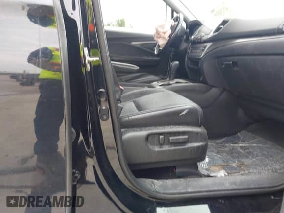 2017 Honda Pilot EX-L with VIN 5FNYF5H57HB027160, listed as a IAAI auction lot 42354810 with 105,251 mi miles and . Bid and sale history available at DreamBid. Image 5.