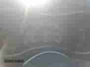 2018 Jeep Grand Cherokee Laredo E with VIN 1C4RJEAG1JC131077, listed as a Copart auction lot 82291615 with 100,413 mi miles and Clean title. Bid and sale history available at DreamBid. Image 9.