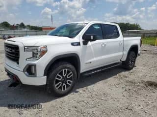2021 GMC Sierra 1500 AT4 with VIN 3GTU9EET1MG453259, listed as a Copart auction lot 69124675 with 77,162 mi miles and Salvage title. Bid and sale history available at DreamBid. Image 1.
